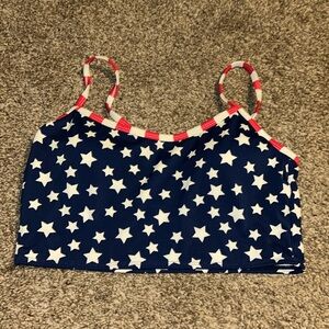 Star Patterned bathing suit top with padded inserts. Ribbed material no tags